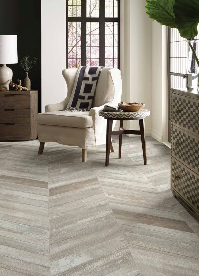 wood look tile floors in a herringbone pattern